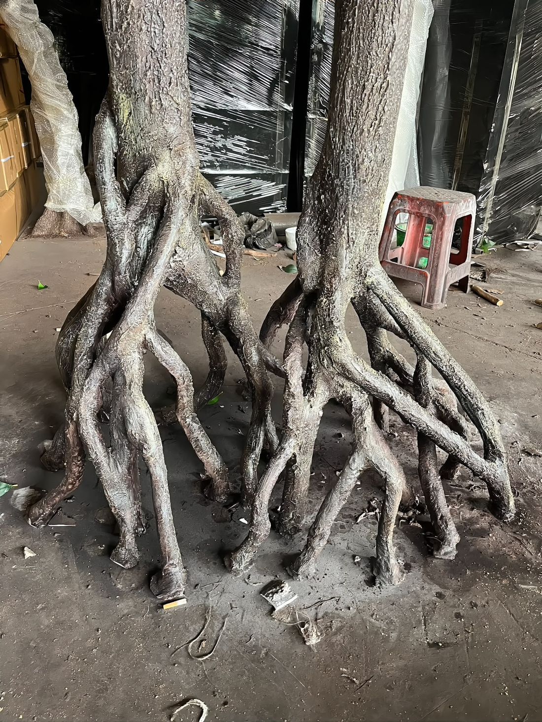 Banyan aerial roots — each root hand-formed and joined to build a natural root cage