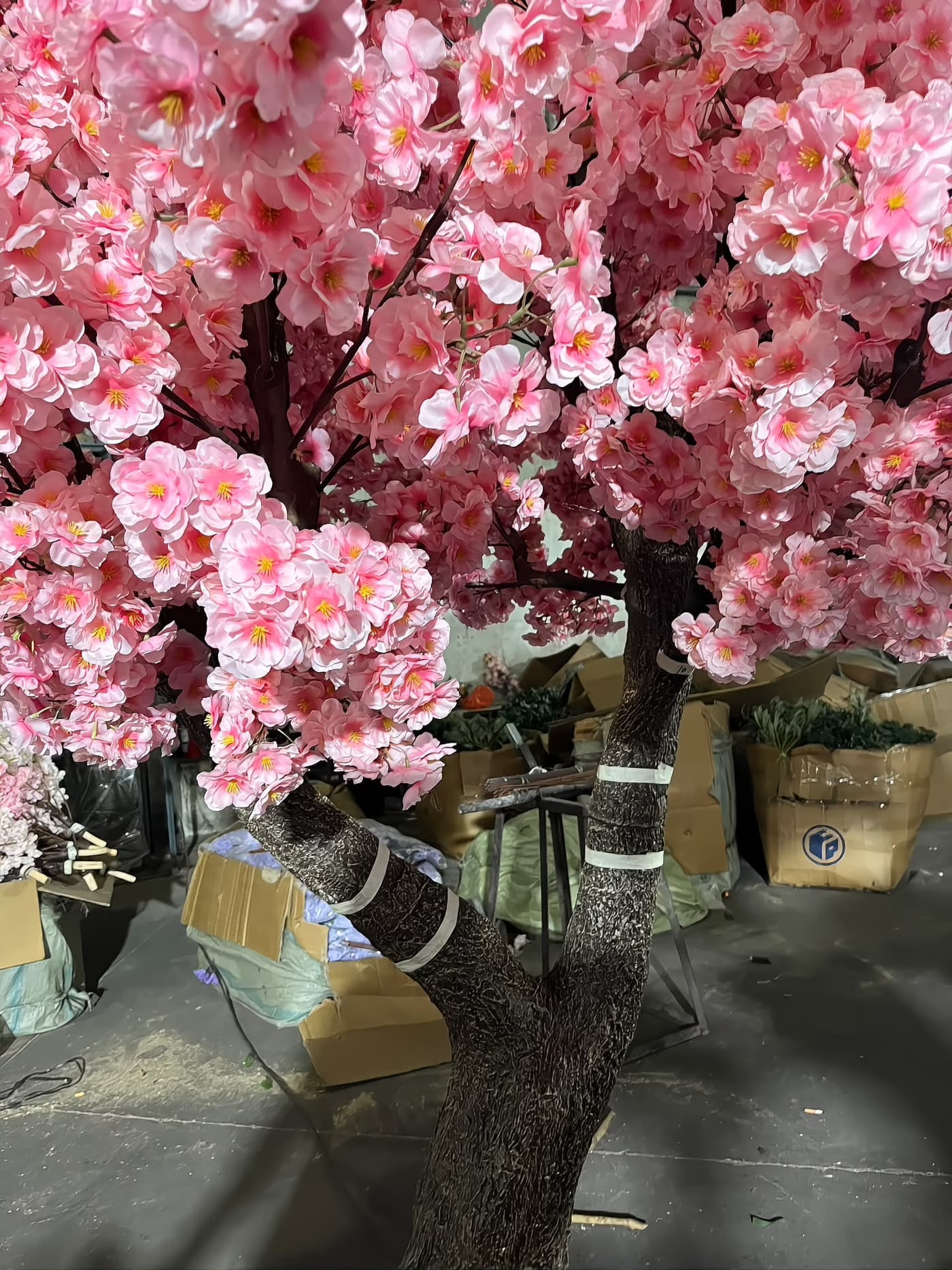 Artificial cherry blossom tree crated for wholesale dispatch in the workshop