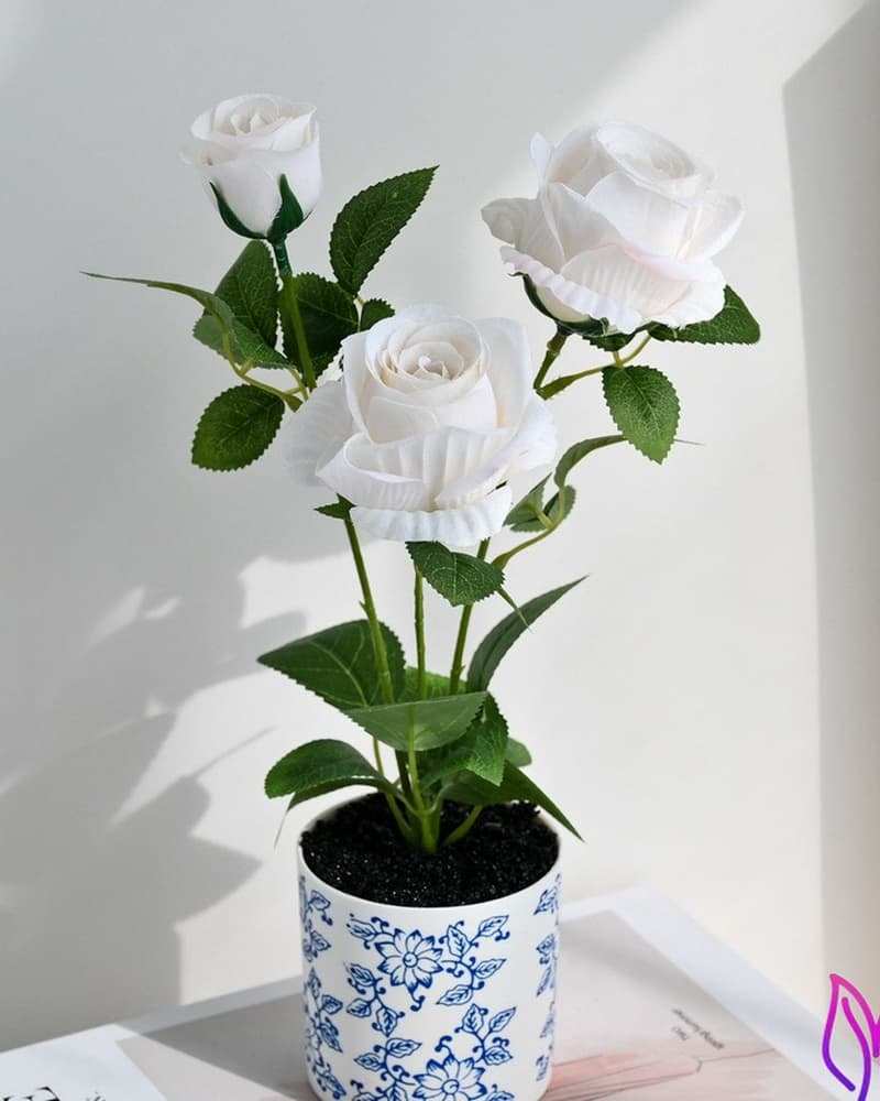 Potted artificial white rose arrangement suitable for hotel room desk and bedside decor